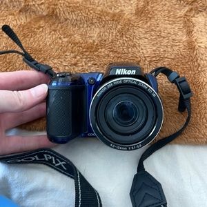 Nikon camera with case and rechargeable batteries